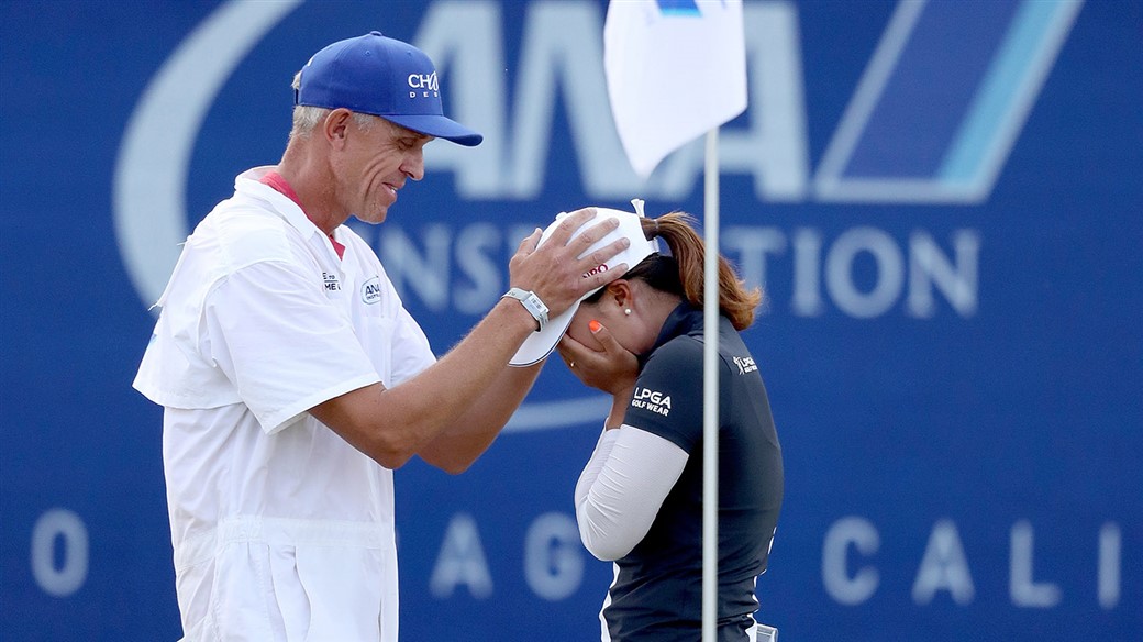  Titleist Pro V1 golf ball player Jin Young Ko celebrates with her caddie after holing the final putt to win the 2019 ANA Inspiration